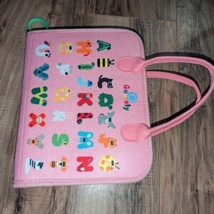 Travel Guolely activity pad in pink. Travel toys for kids.